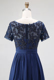 Elegancka granatowa sukienka dla mamy panny młodej linia A